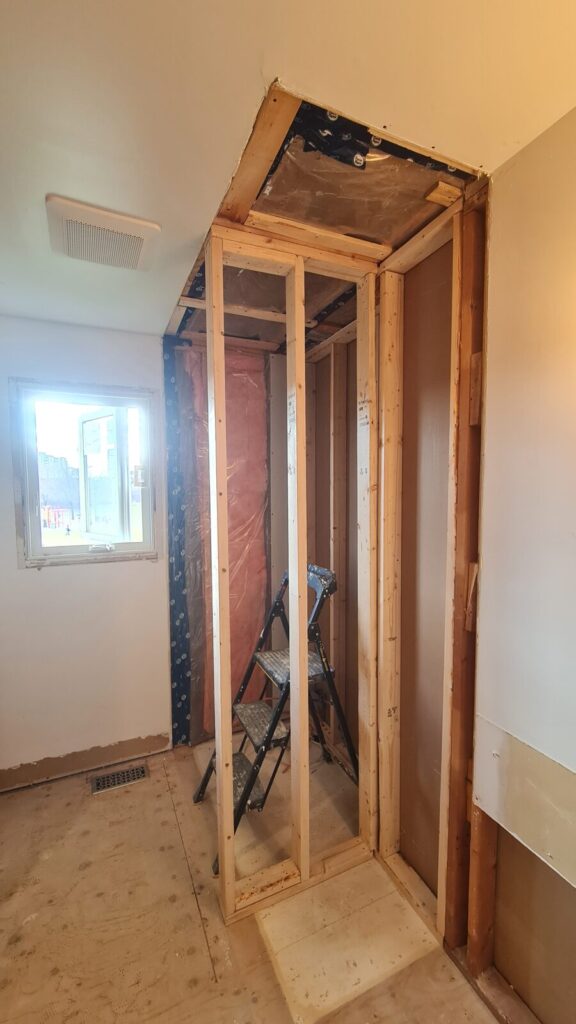Framing the shower alcove and bathtub niches
