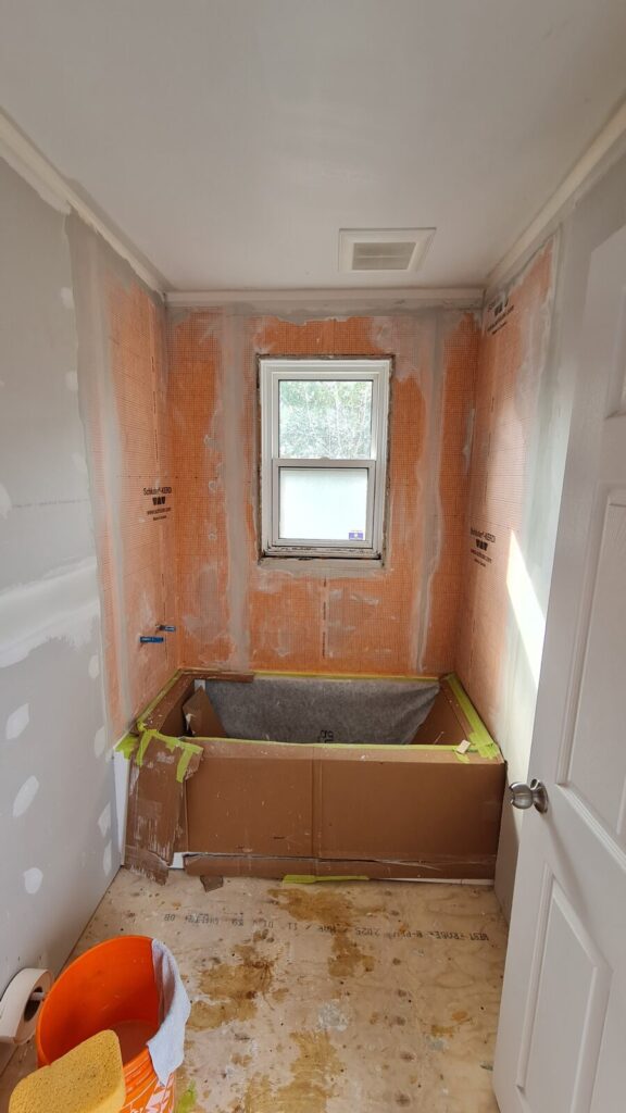 Drywall and finishing stage of the bathroom remodel after rough-in